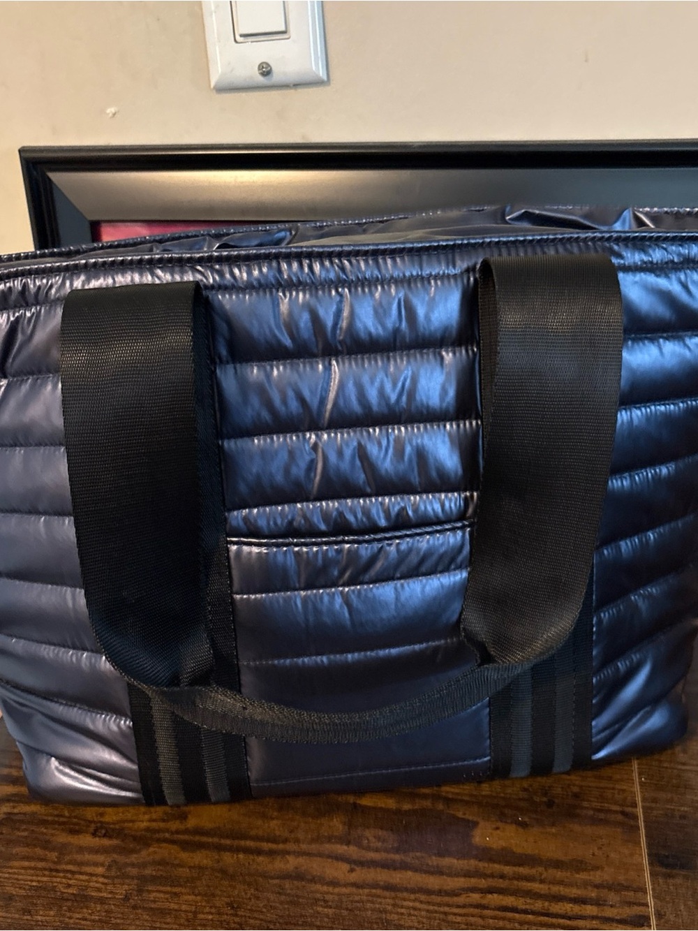 THINK ROYLN Shiny Quilted Navy Tote with Black Webbing Handles